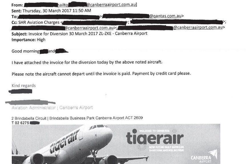 An email saying an invoice is attached, and the plane cannot leave unitl it is paid.