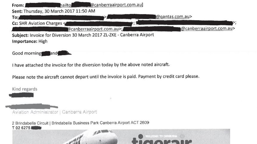 An email saying an invoice is attached, and the plane cannot leave unitl it is paid.