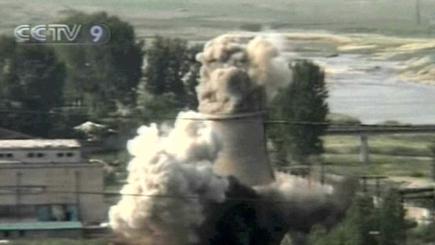 A cooling tower is destroyed at the North Korean Yongbyon nuclear reactor