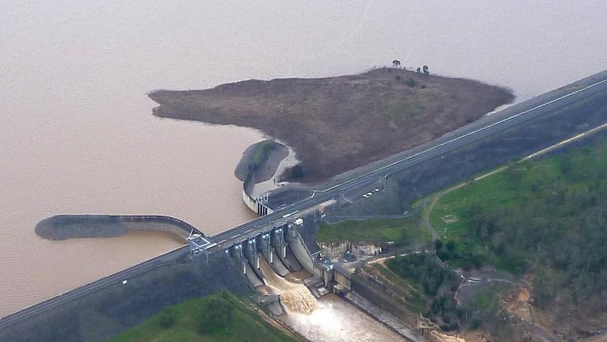 Water pours from a floodgate at Wivenhoe Dam after the 2011 flood.