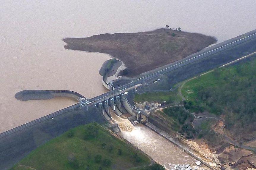 Water pours from a floodgate at Wivenhoe Dam after the 2011 flood.