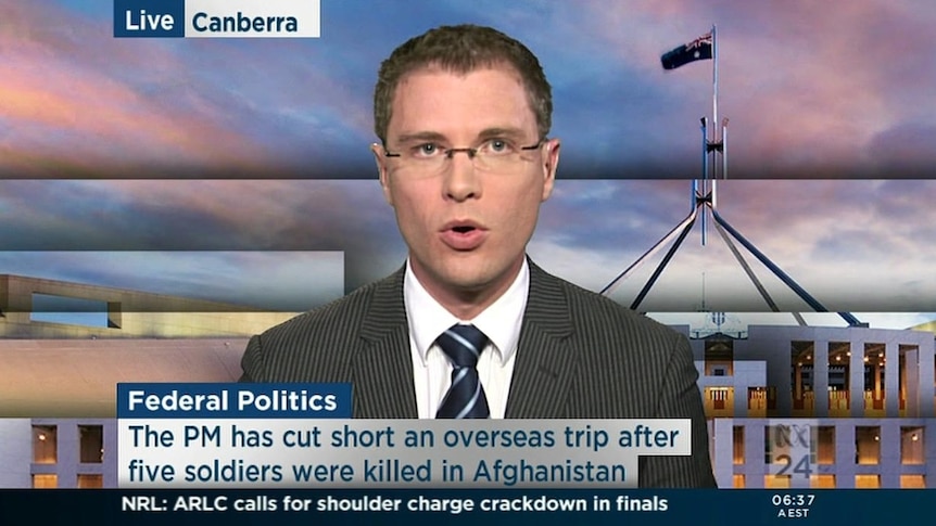 Gillard flies home after Afghan killings