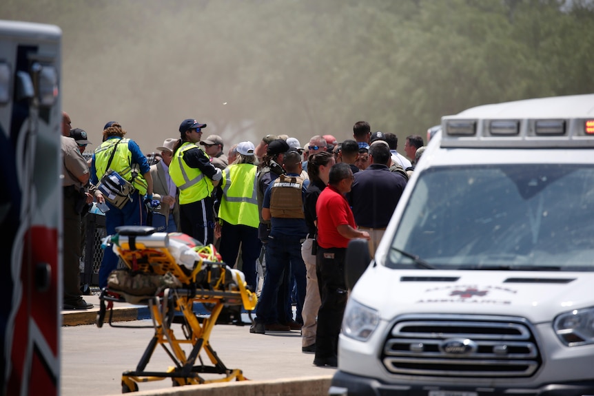 Emergency personnel gather near Robb Elementary School