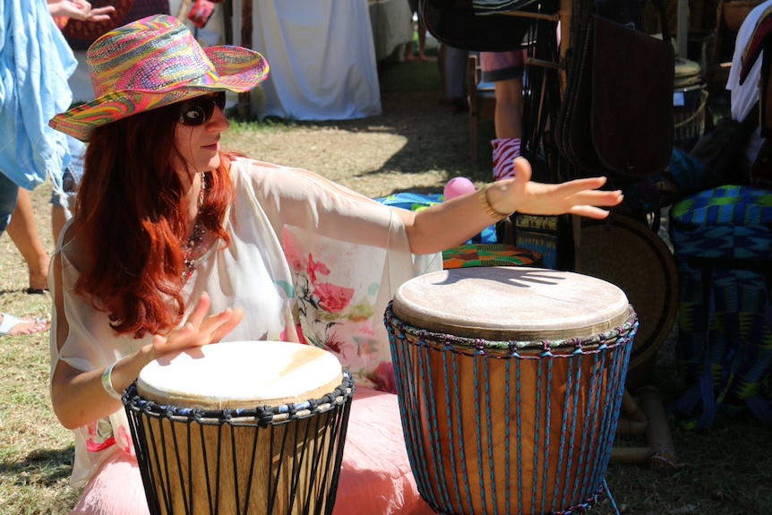 Woman plays drums