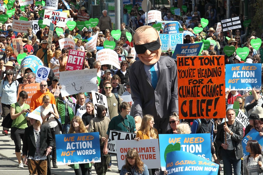 Protesters march through Melbourne calling for action on climate change on September 21.