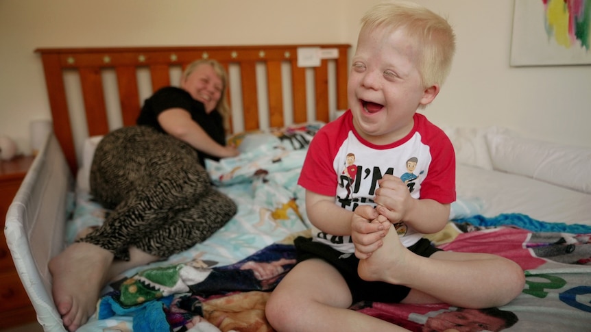 Cassandra Dinkelman with her son George, who has Down syndrome