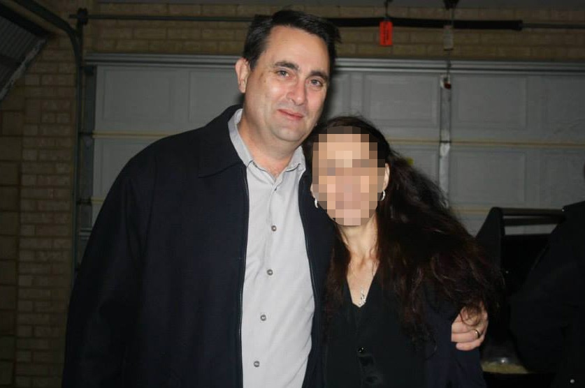 Bradley Robert Edwards standing next to a woman with her face pixellated.