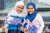 Two girls wearing hijabs in an Australia Day ad.