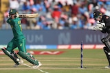 A New Zealand wicketkeeper flinches behind the stumps as a South African batsman square cuts the ball.