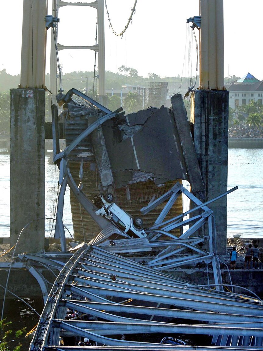 A public bus, cars and motorcycles plunged into the Mahakam river when the bridge collapsed.