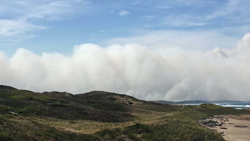 Smoke rises over Couta Rocks Tasmania