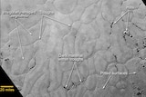 Frozen, craterless plains on Pluto