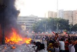 Opponents of president Morsi burn the contents of an office in Alexandria on June 28, 2013
