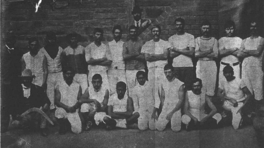 A historical photograph of the Cummeragunja team of Aboriginal footballers in 1900.