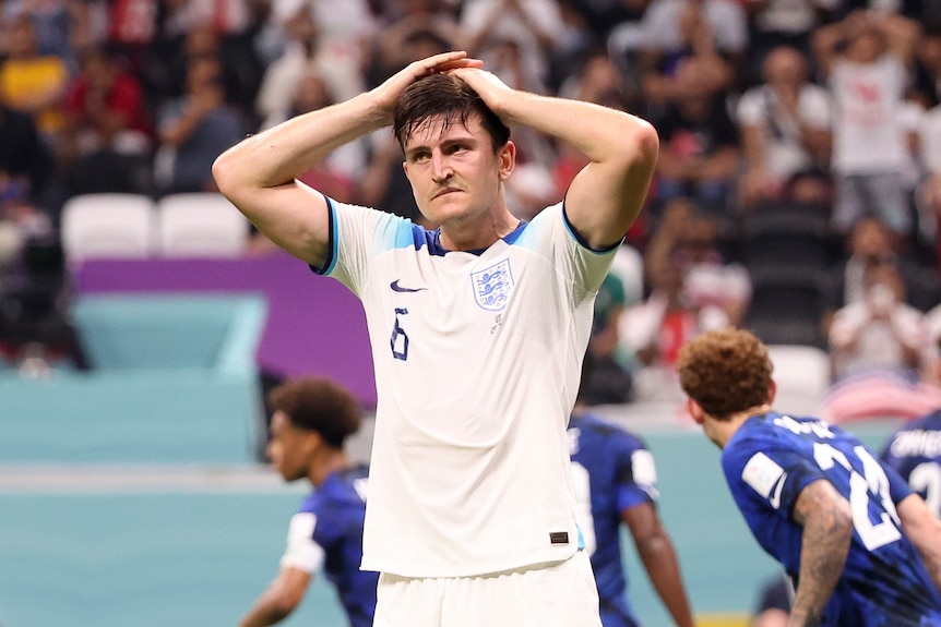 Harry Maguire puts both his hands on his head