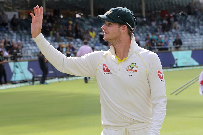 Steve Smith waves to the crowd after clinchin the Ashes