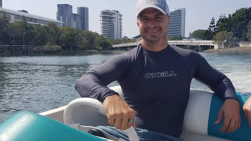 Man sitting in a jet boat. 