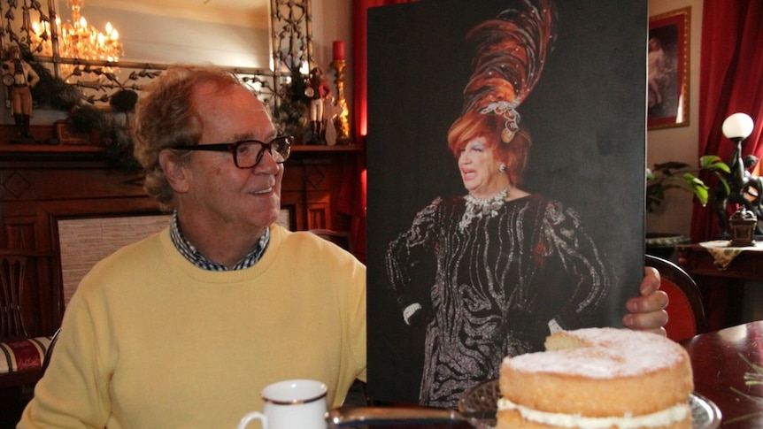Tommy Jeffs with a canvas image of his drag queen character, Tahlulah.