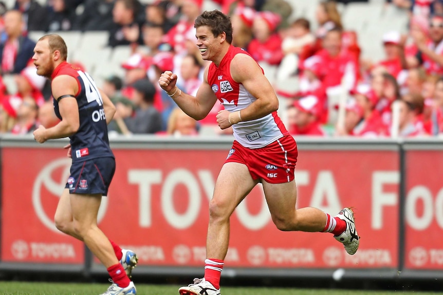 Sydney's Craig Bird celebrates a goal for the Swans against Melbourne at the MCG.