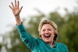 Democratic presidential candidate Hillary Clinton waves