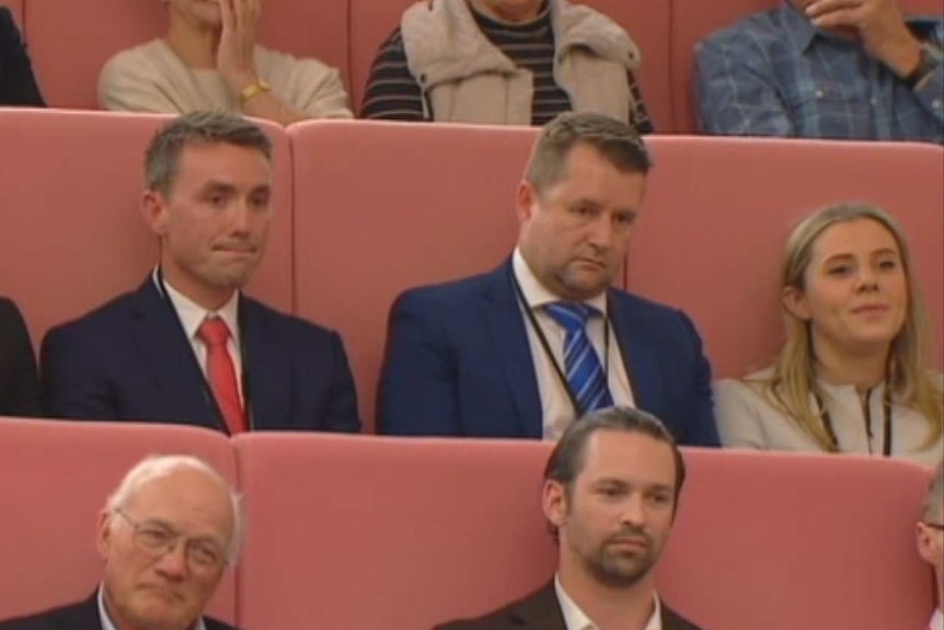 James Ashby, Bill McNee and Renata sit in gallery