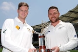 The prize at stake ... Steve Smith (L) and Brendon McCullum show off the Trans-Tasman Trophy