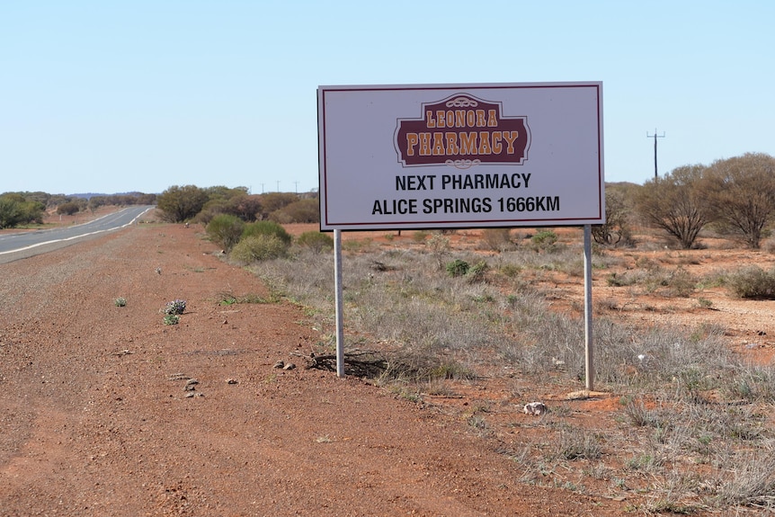 A road sign reading Leonora Pharmacy, next pharmacy Alice Springs 1666km 