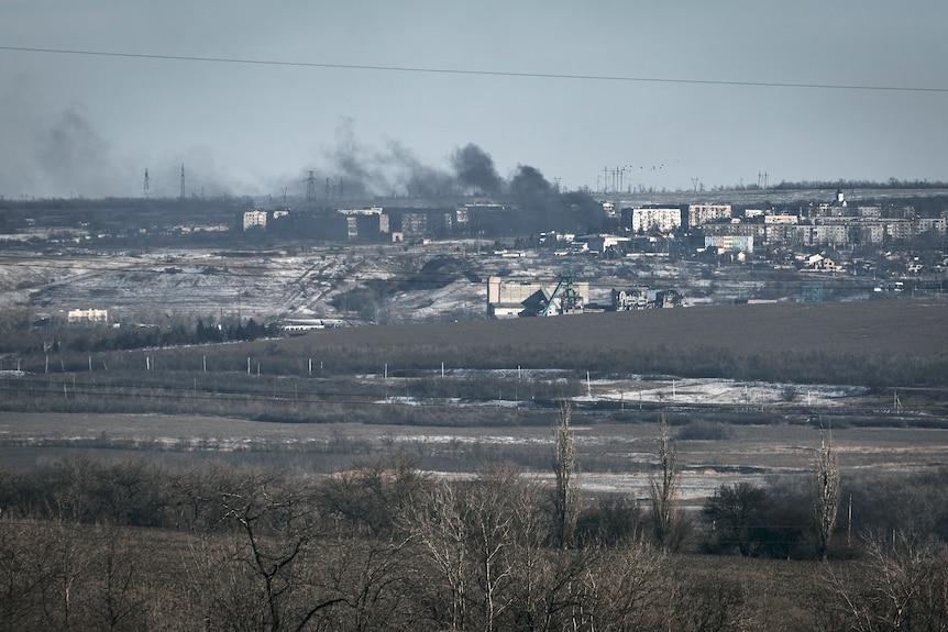 Black smoke seen rising above area hit by shelling in Soledar.