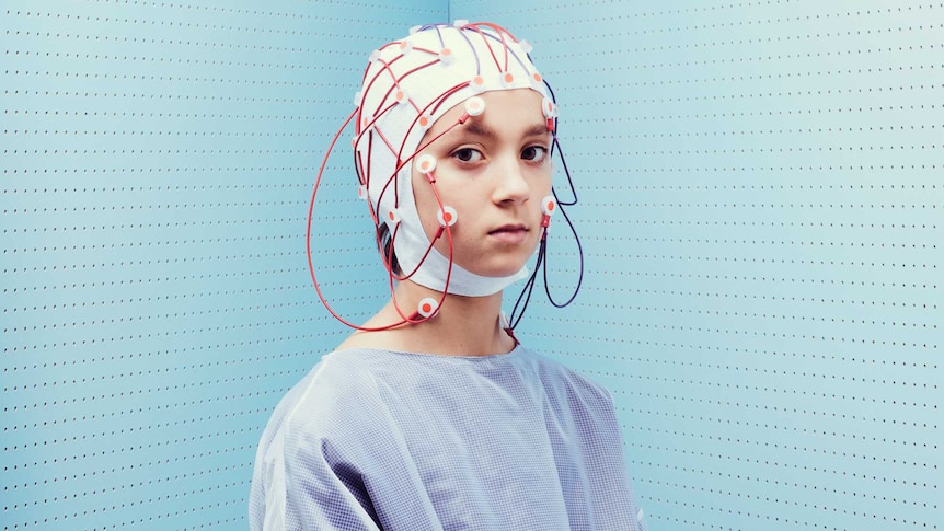 Teenager with neuro cap on