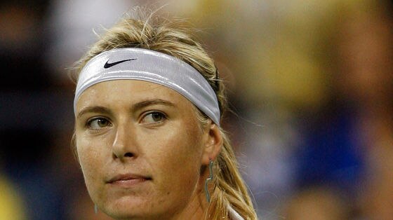 Sharapova wins: Jelena Jankovic was forced to retire trailing 5-2 in the first set.