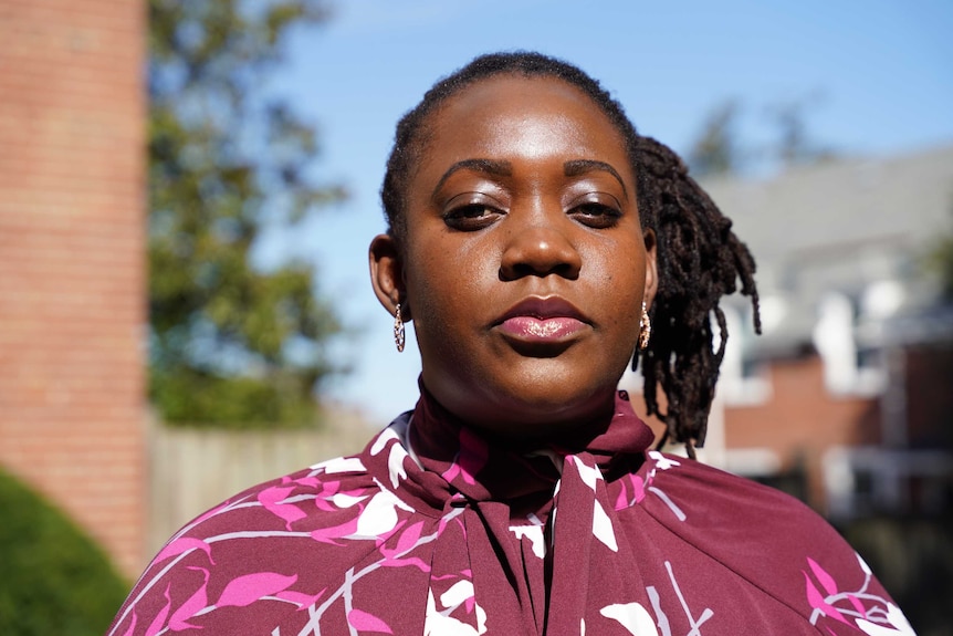 A portrait of a woman looking sombre