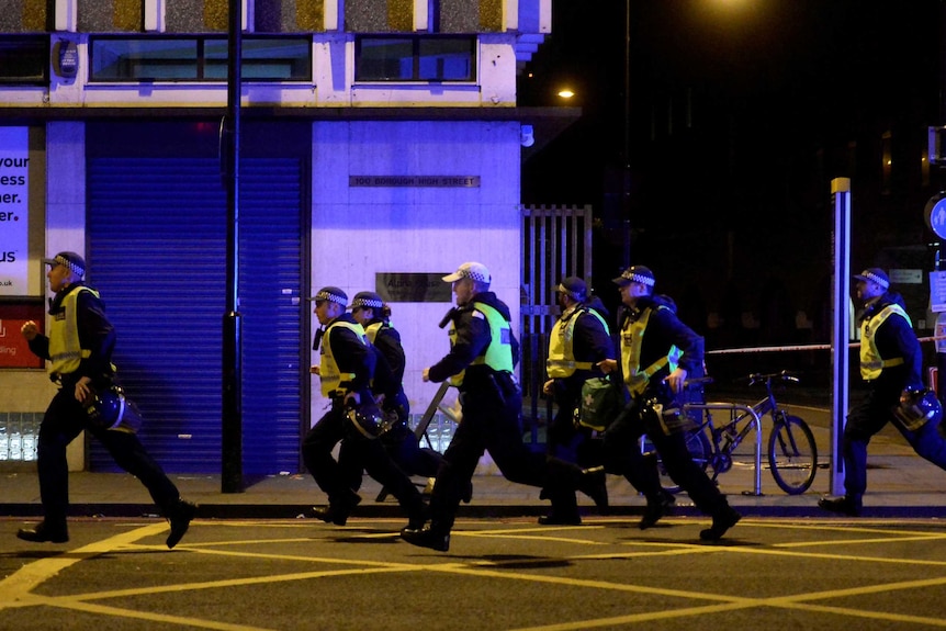 Police attend to an incident on London Bridge.