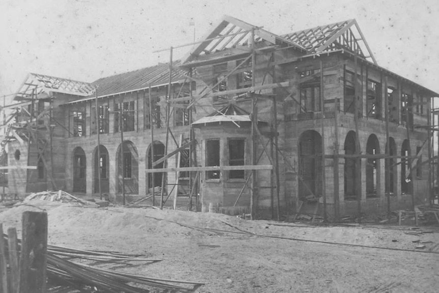 A historic photo of a convent being built.