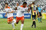 Roar striker Jean Carlos Solorzano celebrates during Brisbane's demolition of the Mariners in November.