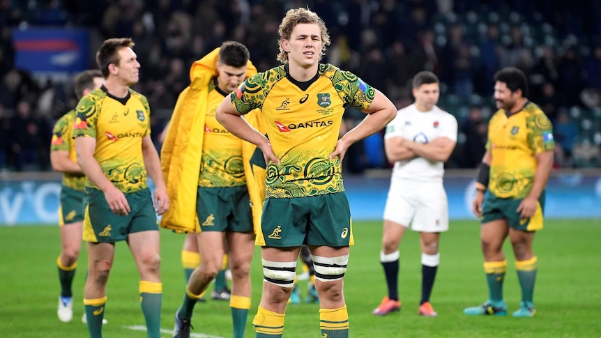 Ned Hanigan stands on the field at Twickenham with his hands on his hips after Wallabies lost to England.