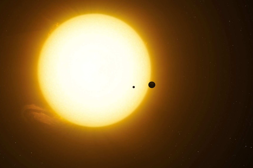 Illustration of an exoplanet and moon