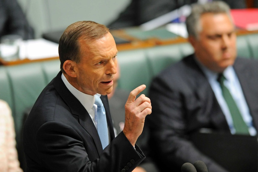 Tony Abbott gestures during Question Time on October 9, 2012.