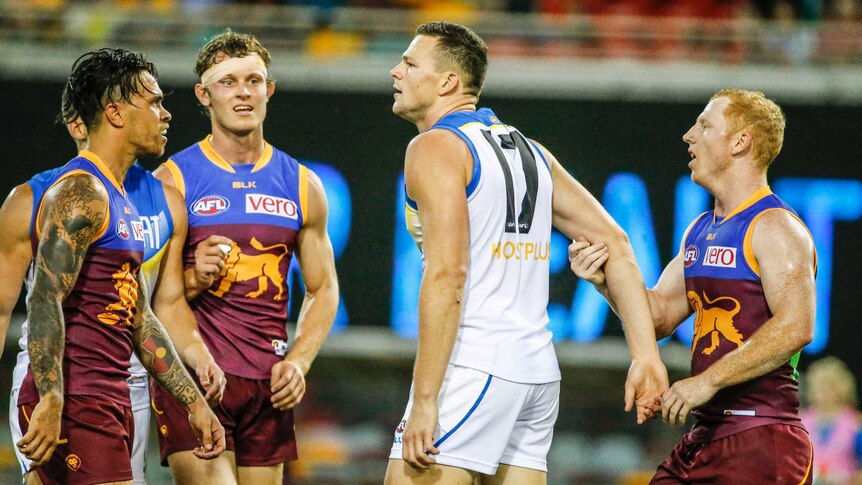 Steven May confronts Brisbane Lions players