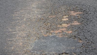 close up of cracked road 