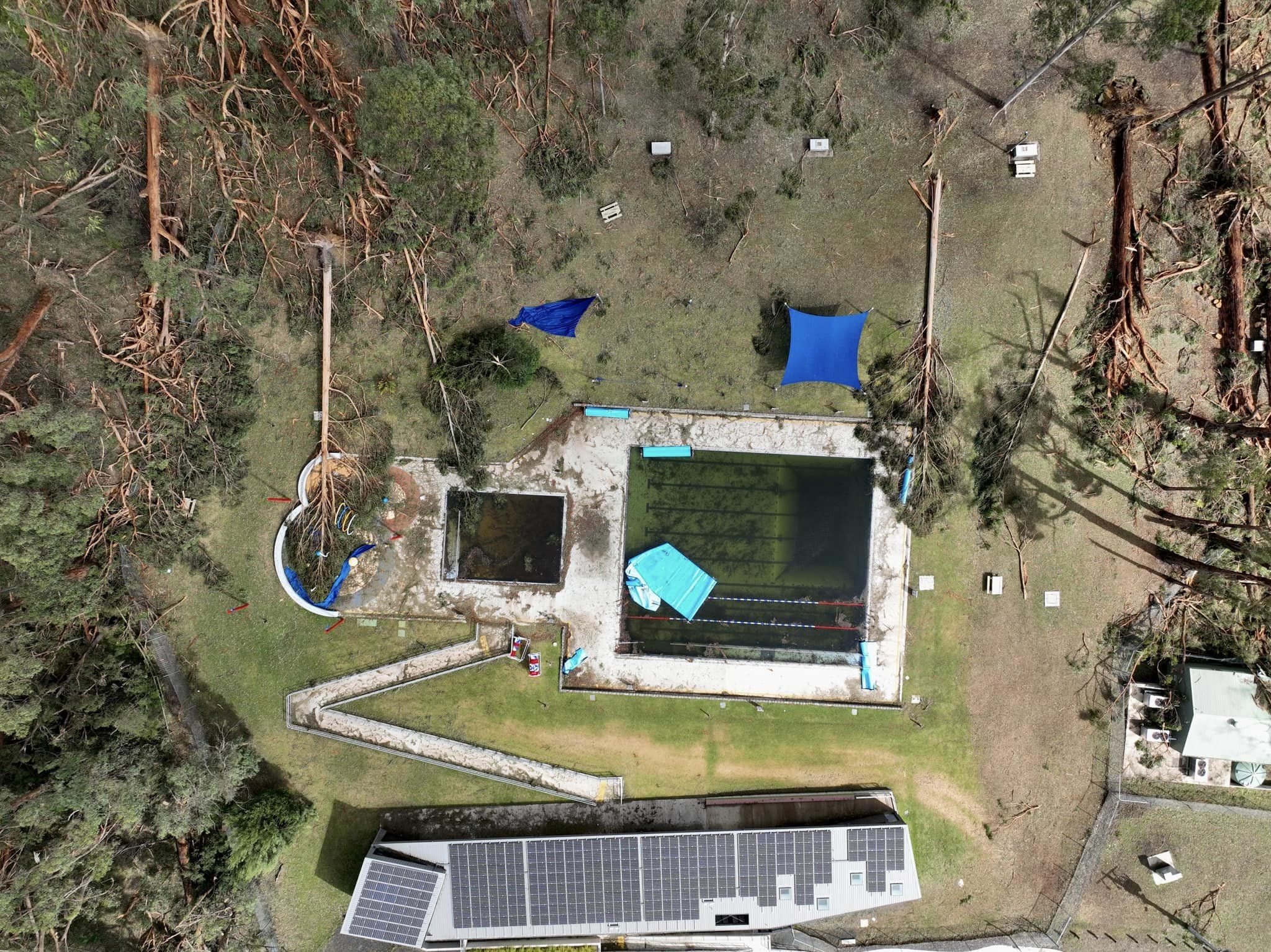 aerial image of damaged local pool
