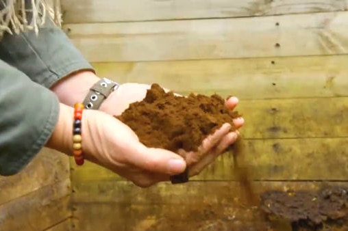 Woman holds soil between her hands illustrating our Gardening Australia episode recap.