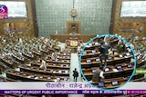 A man jumps into the the lower house of the Indian Parliament.