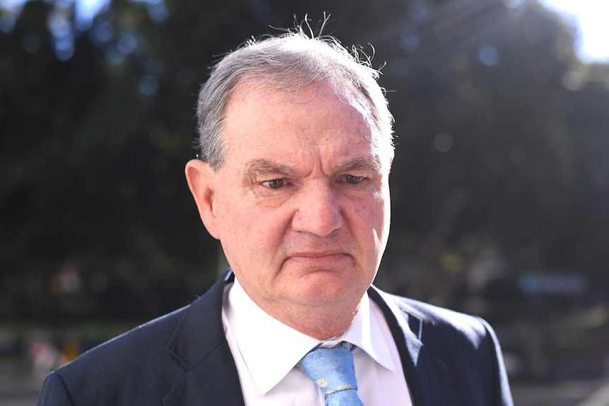 Headshot of former Ipswich mayor Paul Pisasale arrives at the District Court in Brisbane.