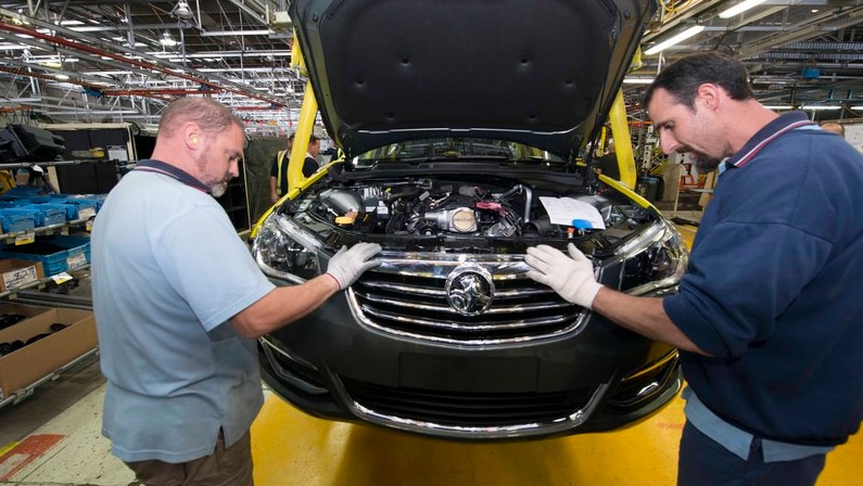 Holden workers manufacture the Holden VF Commodore at the Elizabeth assembly plant in South Australia.