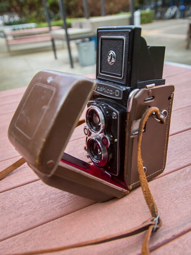 Cameras like the Yashica-D used film and slides before digital cameras became popular.