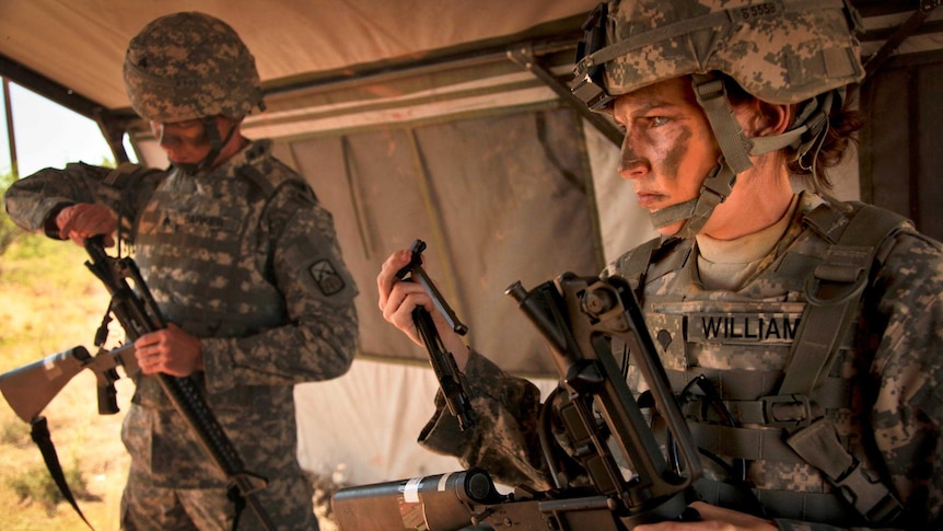 A female US soldier in combat.