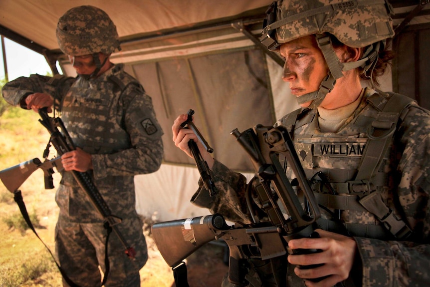 A female US soldier in combat.