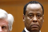 Conrad Murray, right, appears with a member of his defence team