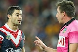 Anthony Minichiello speaks to referee Jared Maxwell