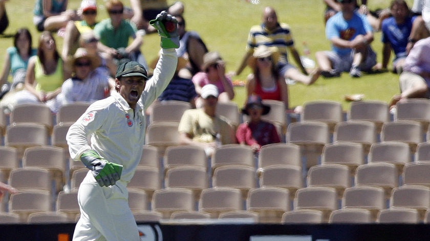 Going out in style... Adam Gilchrist celebrates as he dismisses VVS Laxman in his final Test